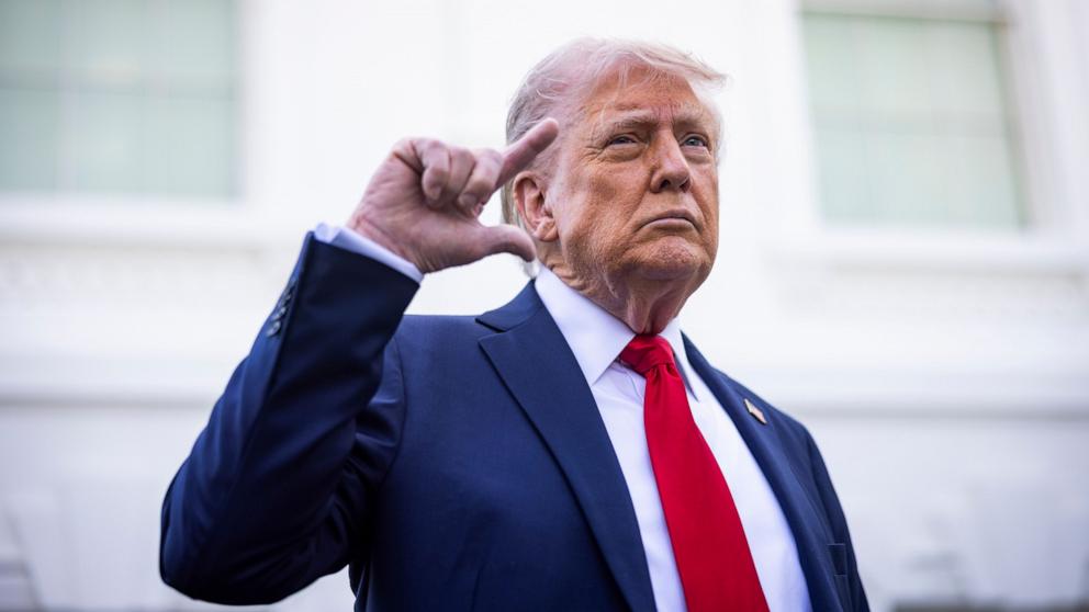 PHOTO: President Donald Trump speaks briefly to the media after a surprise appearance on the North Lawn, where he said he was inspecting where to put a flag pole, in Washington, April 23, 2025.