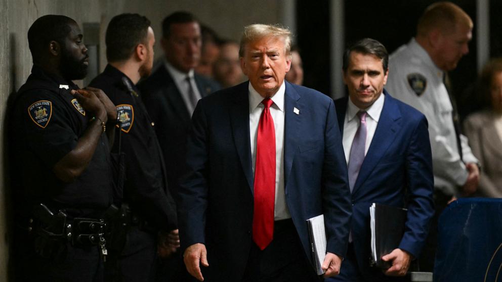 Former President Donald Trump, with his lawyer Todd Blanche, walks to speak to the press at the end of the day of his trial at Manhattan Criminal Court in New York City, May 16, 2024. US-POLITICS-JUSTICE-COURT-TRUMP