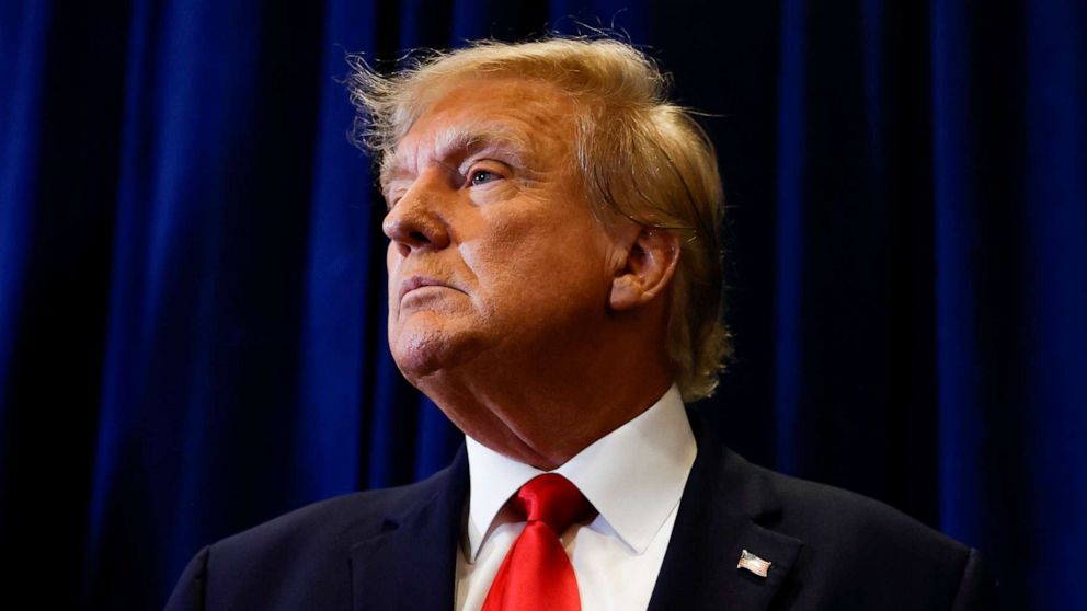 PHOTO: Former President Donald Trump speaks to reporters before his speech at the annual Conservative Political Action Conference (CPAC), Mar. 4, 2023, in National Harbor, Md.