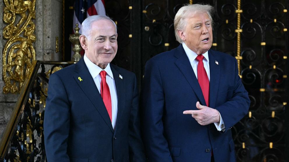PHOTO: President Donald Trump greets Israeli Prime Minister Benjamin Netanyahu upon arrival at Trump's Mar-a-Lago residence in Palm Beach, Fla., December 29, 2025. 
