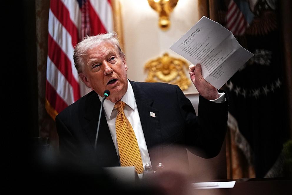 PHOTO: President Donald J Trump holds a lists of potential legislation should Republicans remove the Senate filibuster, as he hosts a bilateral lunch with Prime Minister of Hungary Viktor Orban at the White House in Washington, November 7, 2025.