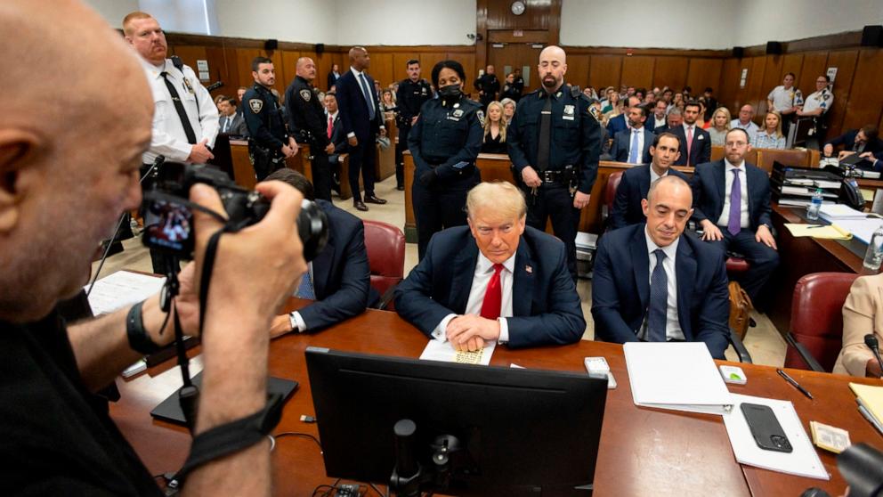 PHOTO: Former President and Republican presidential candidate Donald Trump sits in court during his trial for allegedly covering up hush money payments at Manhattan Criminal Court in New York City, May 28, 2024. 