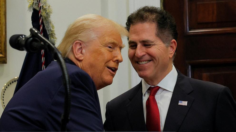PHOTO: President Donald Trump greets CEO of Dell Technologies Michael Dell in the Roosevelt Room at the White House in Washington, December 2, 2025.