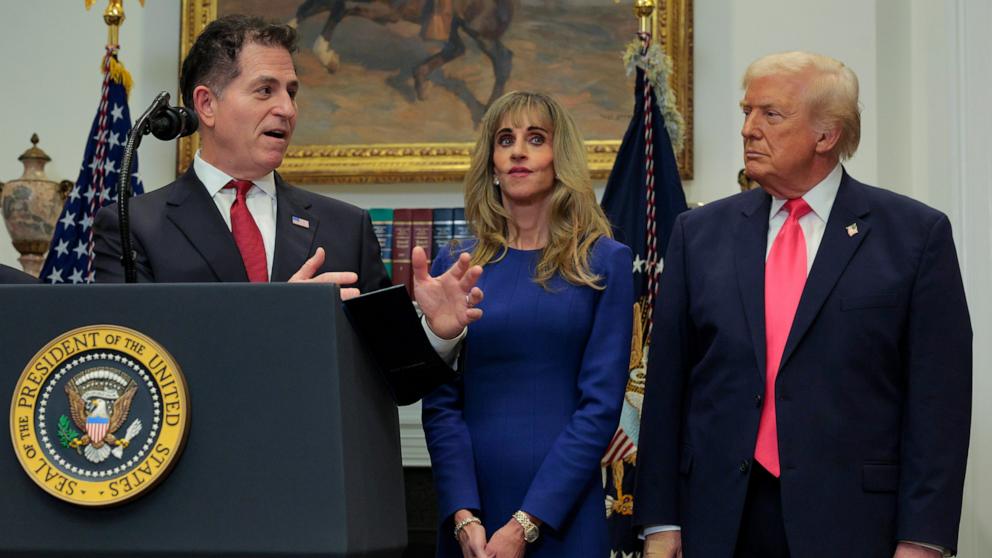 PHOTO: Tech billionaire Michael Dell speaks as his wife Susan Dell and U.S. President Donald Trump look on while making an announcement about "Trump accounts" in the Roosevelt Room at the White House on Dec. 2, 2025 in Washington.