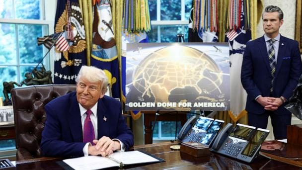 President Donald Trump makes an announcement regarding the Golden Dome missile defense shield next to U.S. Defense Secretary Pete Hegseth in the Oval Office of the White House in Washington, May 20, 2025. 