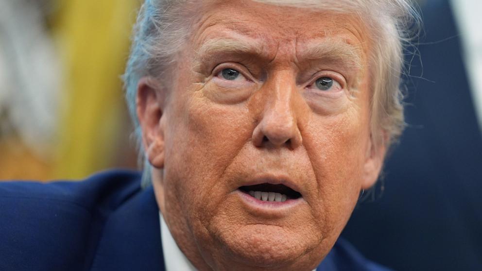 PHOTO: President Donald Trump speaks to reporters after signing executive orders regarding nuclear energy in the Oval Office of the White House, May 23, 2025, in Washington.