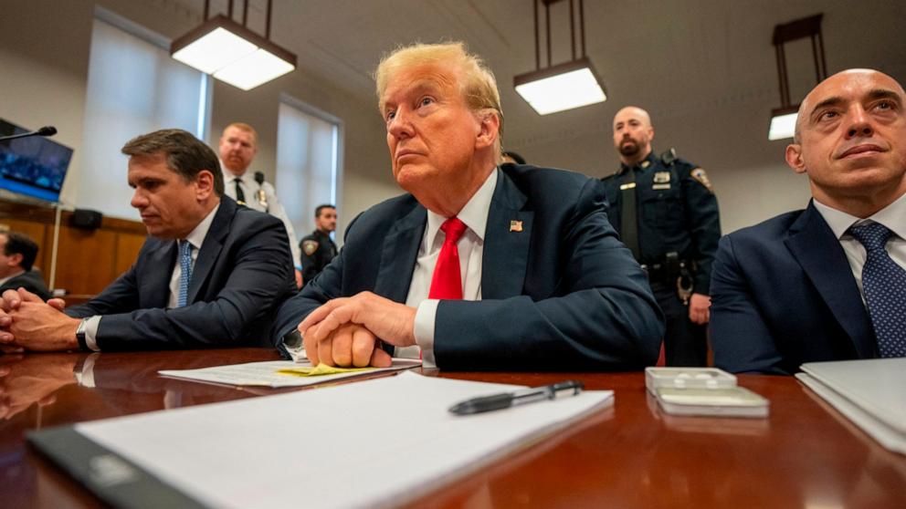 PHOTO: Former President and Republican presidential candidate Donald Trump sits in court during his trial for allegedly covering up hush money payments at Manhattan Criminal Court in New York City, May 28, 2024.