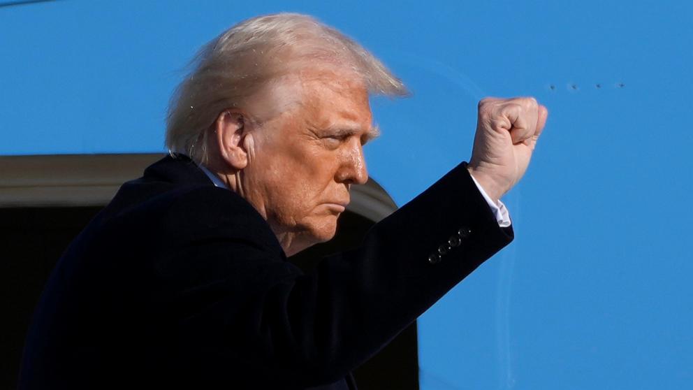 PHOTO: President Donald Trump gestures as he boards Air Force One at Joint Base Andrews, Md., Feb. 14, 2025, en route to West Palm Beach, Fla.