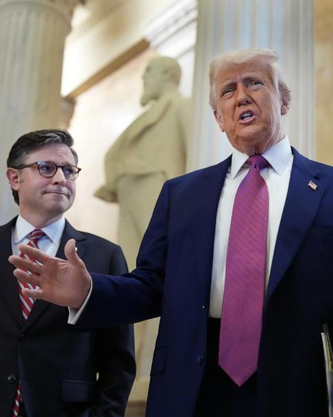 President Donald Trump and House Speaker Mike Johnson speak to members of the media before a closed House Republican Conference meeting on Capitol Hill in Washington, May 20, 2025.