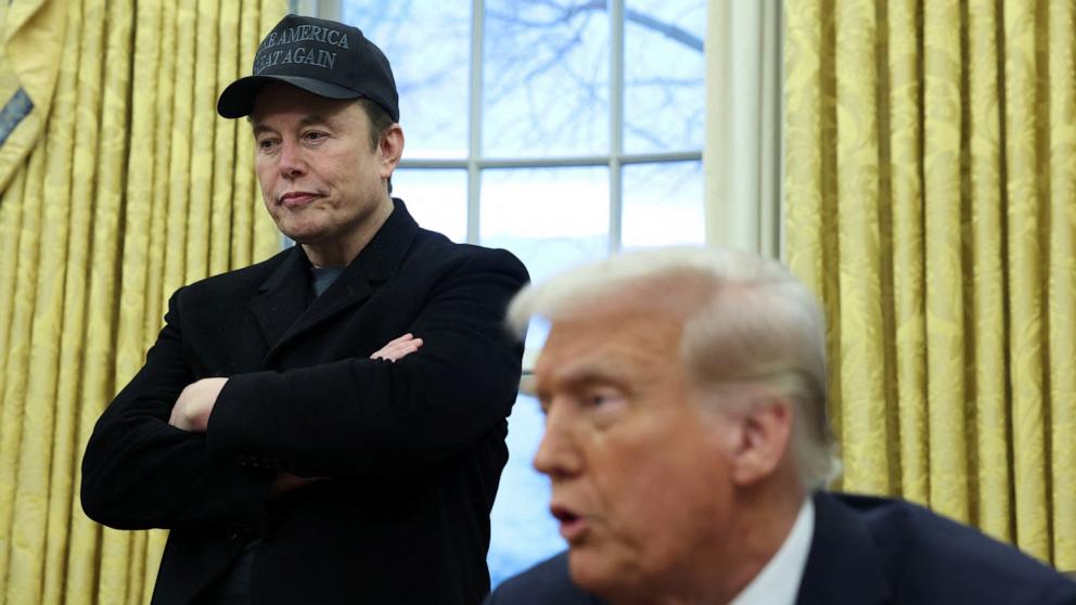 PHOTO: Elon Musk listens to President Donald Trump speak in the Oval Office of the White House in Washington, Feb. 11, 2025.