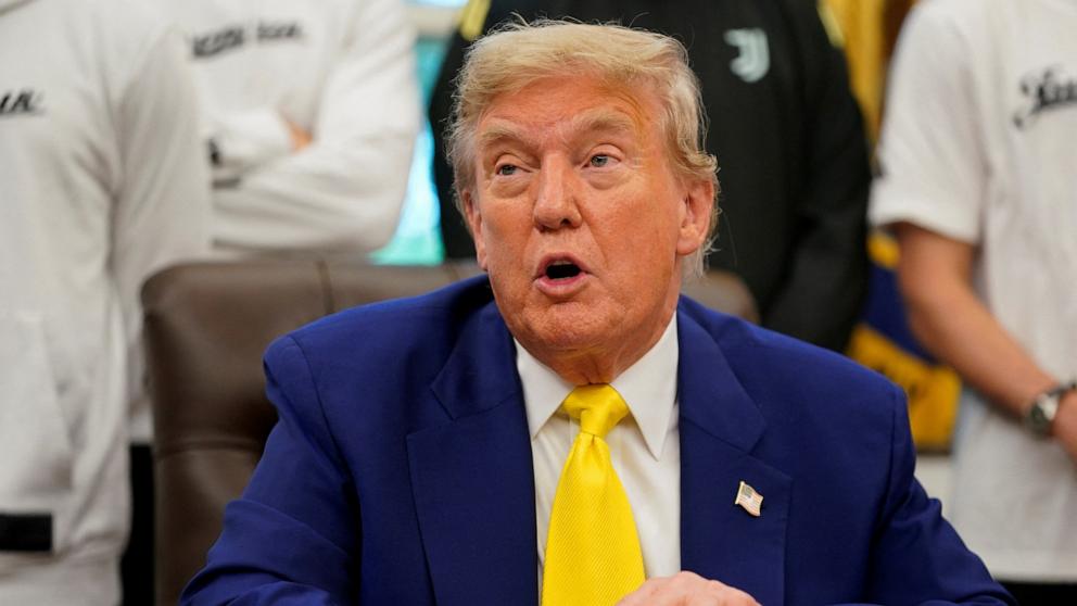 PHOTO: President Donald Trump speaks to the press in the Oval Office of the White House as members of Italian soccer club Juventus pay a visit in Washington, June 18, 2025.