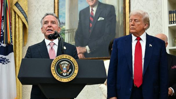 Special Envoy to the Middle East Steve Witkoff speaks to the meida as President Donald Trump listens in the Oval Office of the White House in Washington, May 28, 2025.