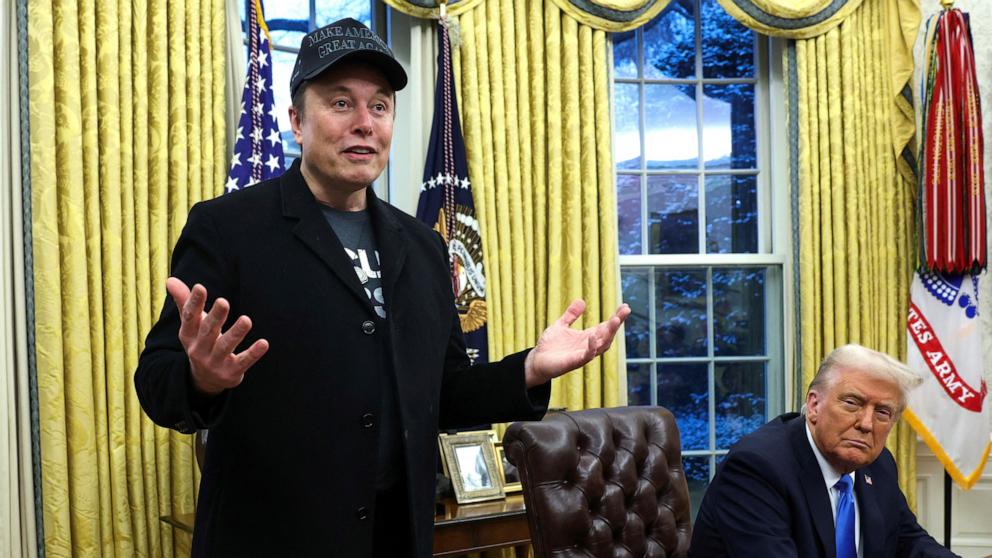 PHOTO: Elon Musk speaks next to President Donald Trump in the Oval Office of the White House in Washington, Feb. 11, 2025.