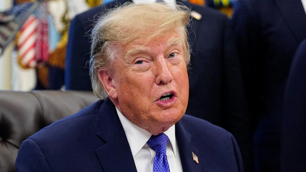 PHOTO: President Donald Trump answers questions from reporters during an announcement in the Oval Office at the White House, September 28, 2026 in Washington.