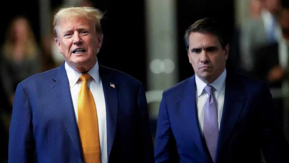 PHOTO: Former President Donald Trump speaks to members of the media next to his attorney Todd Blanche at Manhattan criminal court, May 7, 2024, in New York.