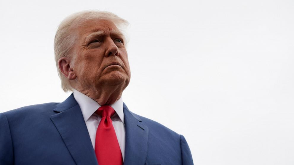 PHOTO: President Donald Trump talks to reporters at Morristown Municipal Airport in Morristown, New Jersey, June 8, 2025, en route to Camp David.