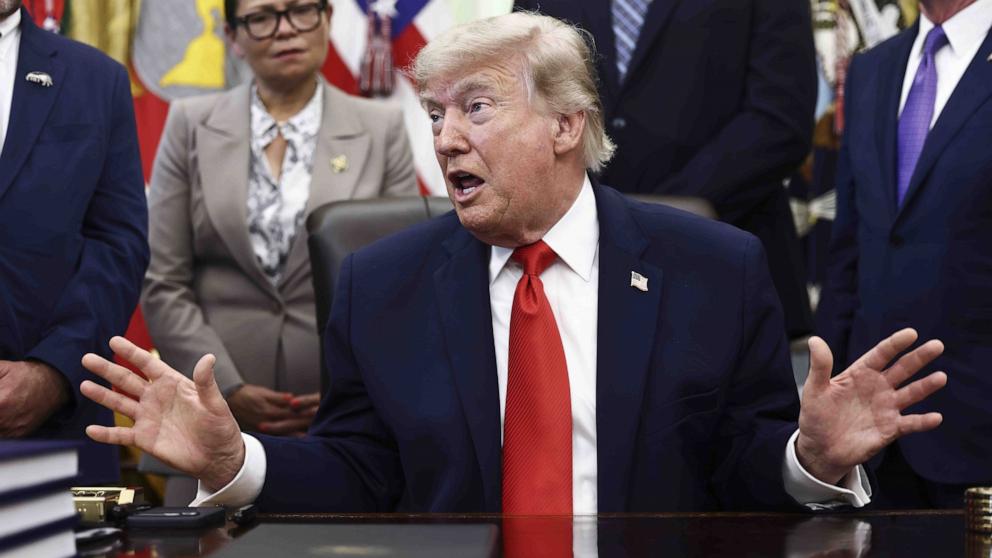 PHOTO: President Donald Trump responds to a question from the news media after signing a fisheries proclamation in the Oval Office of the White House in Washington, June 11, 2026.