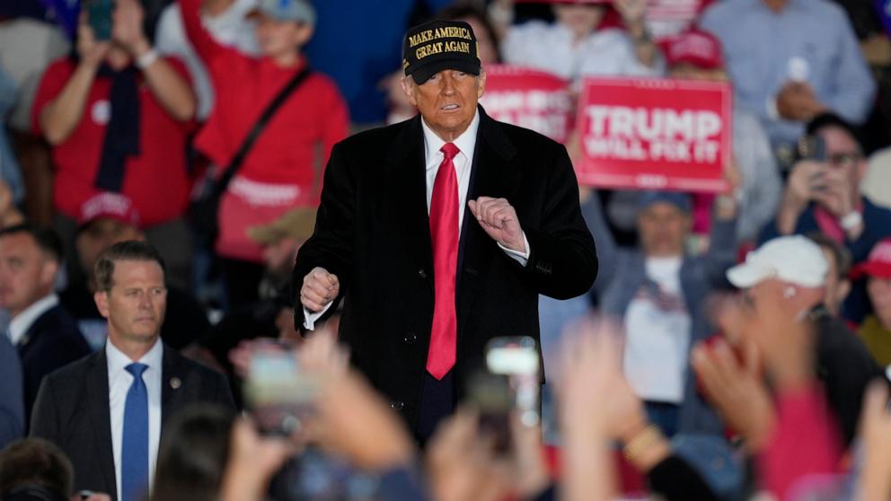 PHOTO: Republican presidential nominee former President Donald Trump dances at a campaign rally at Kinston Jet Center, Nov. 3, 2024, in Kinston, N.C.