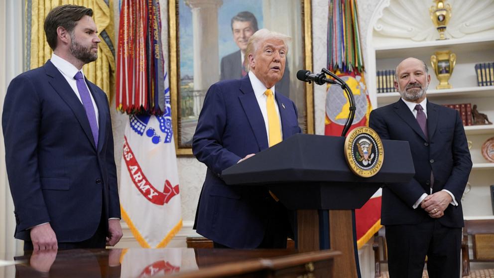 PHOTO: President Donald Trump speaks in the Oval Office of the White House next to Vice President JD Vance and Commerce secretary Howard Lutnick in the Oval Office at the White House, in Washington, Feb. 21, 2025.