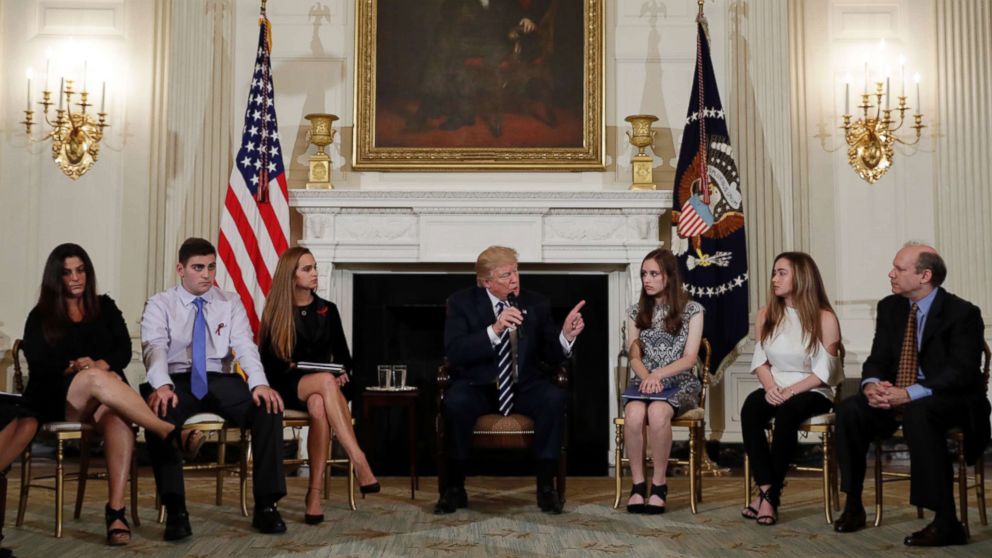 PHOTO: President Donald Trump speaks as he hosts a listening session with high school students, teachers and parents in the State Dining Room of the White House in Washington, D.C., Feb. 21, 2018.