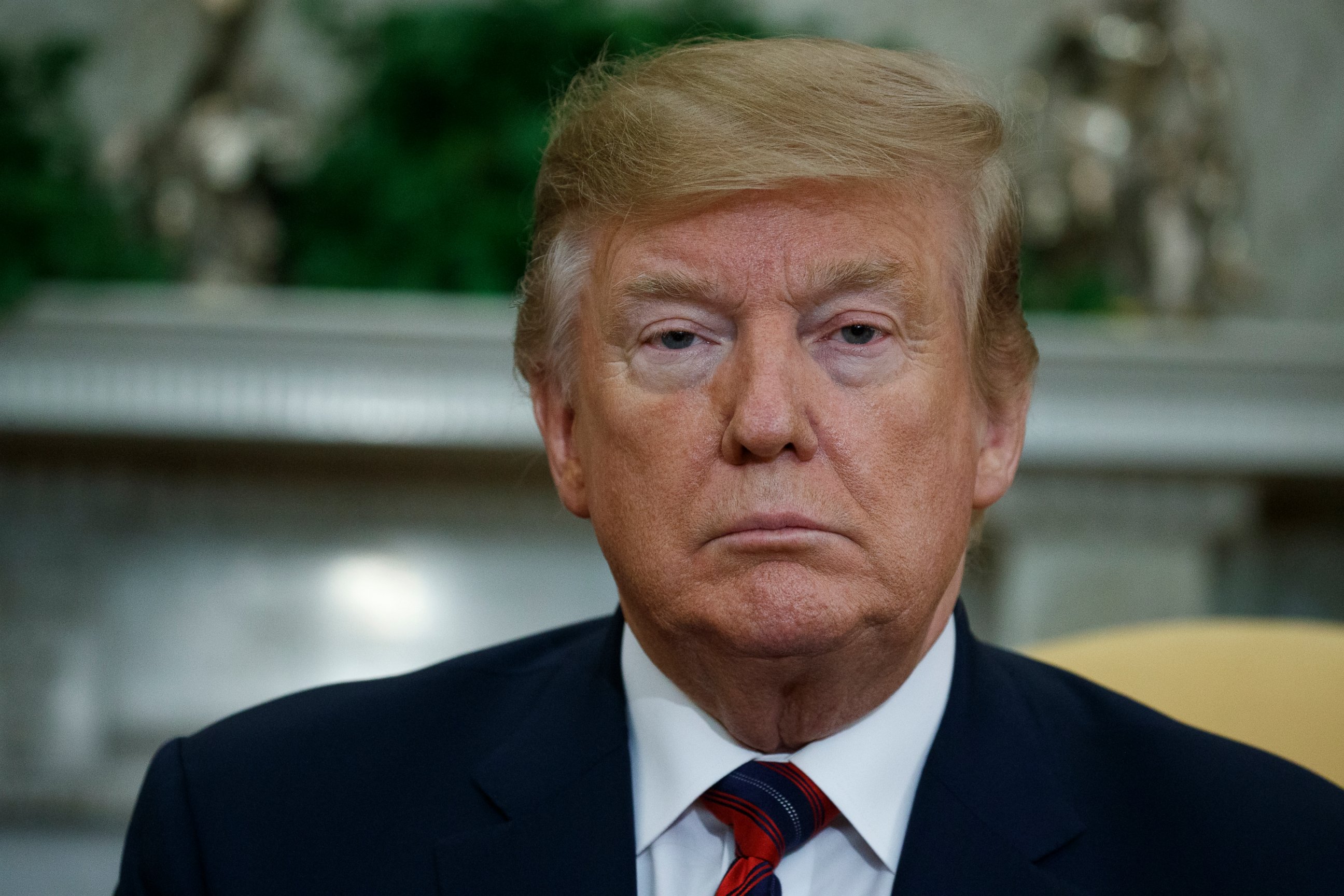 PHOTO: President Donald Trump listens to South Korean President Moon Jae-In speak during a meeting in the Oval Office of the White House, Thursday, April 11, 2019, in Washington.