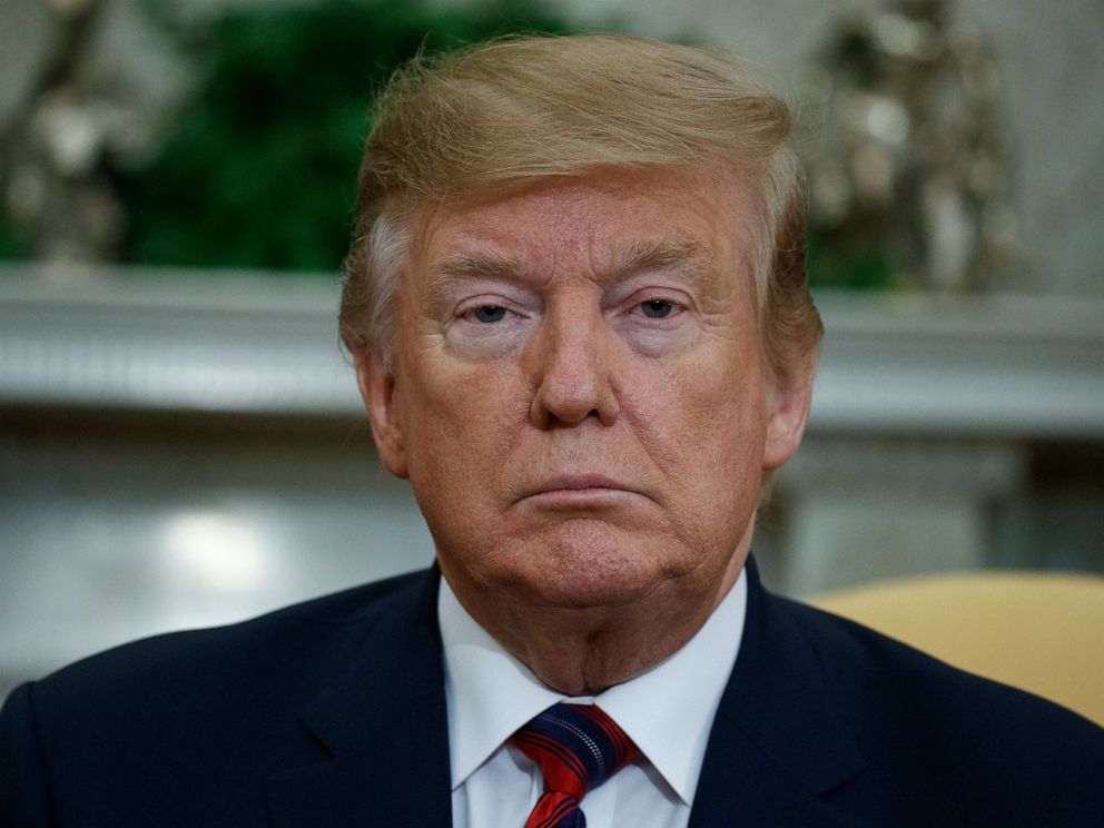 PHOTO: President Donald Trump listens to South Korean President Moon Jae-In speak during a meeting in the Oval Office of the White House, Thursday, April 11, 2019, in Washington.