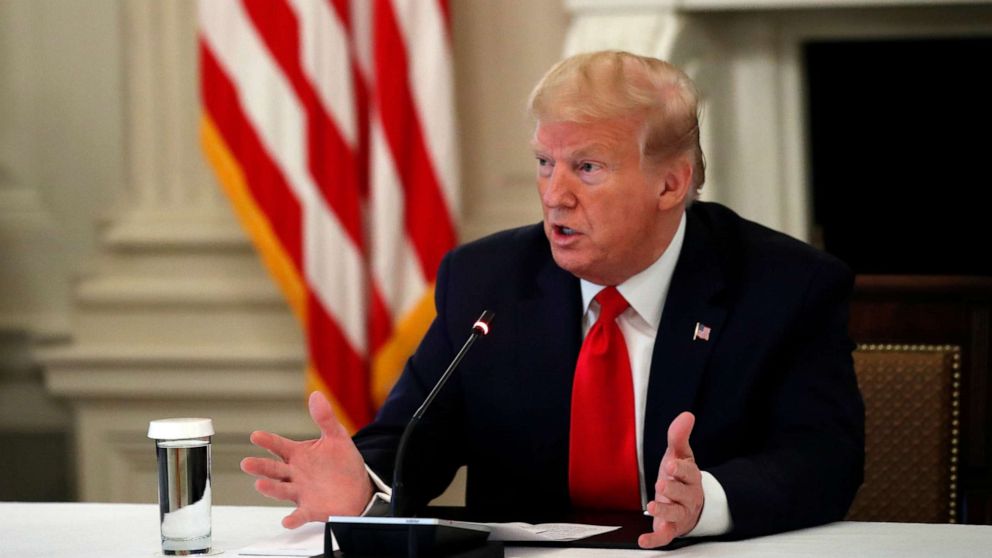 PHOTO: President Donald Trump speaks about reopening the country, during a roundtable with industry executives, in the State Dinning Room of the White House, April 29, 2020, in Washington.