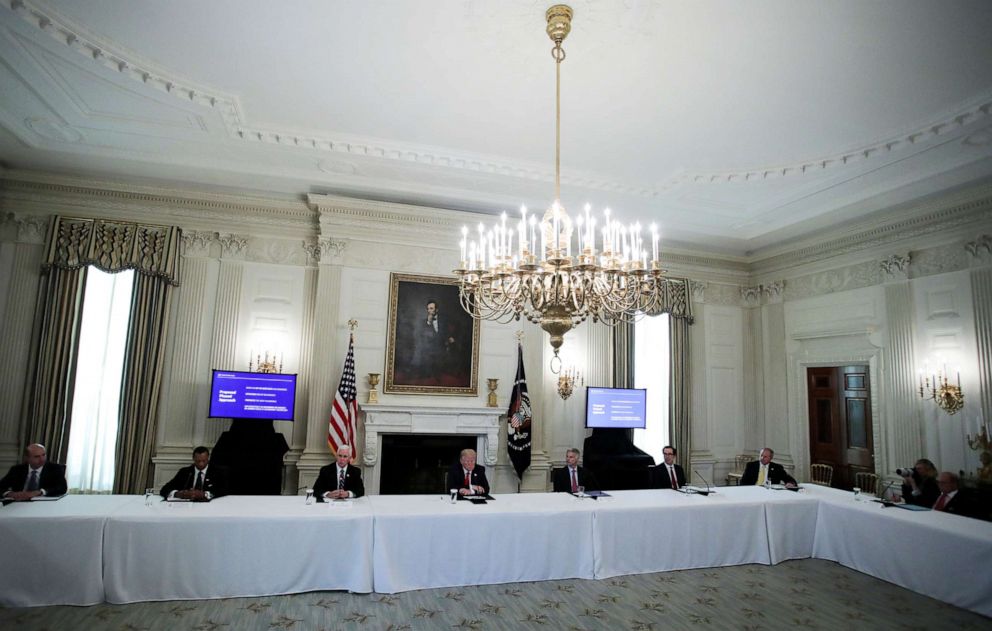 PHOTO: President Donald Trump participates in a round table discussion with industry executives in the State Dining Room at the White House in Washington, April 29, 2020.