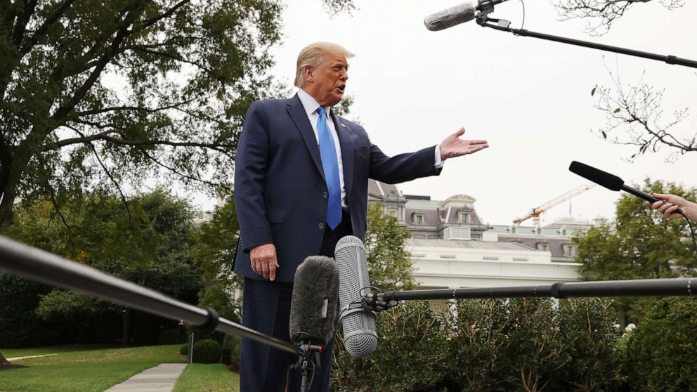 PHOTO: President Donald Trump talks to journalists before departing the White House, Sept. 24, 2020, in Washington.