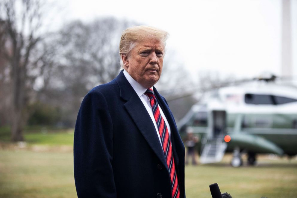 PHOTO: President Donald Trump speaks to the media about Syria, Nancy Pelosi, and his proposed border wall as he departs the White House for Dover Air Force Base on the South Lawn of the White House in Washington, D.C., Jan. 2019. 