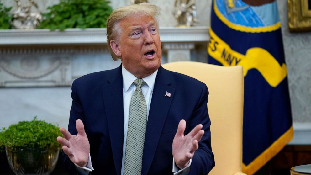 PHOTO: President Donald Trump speaks in the Oval Office of the White House, March 12, 2020, in Washington.