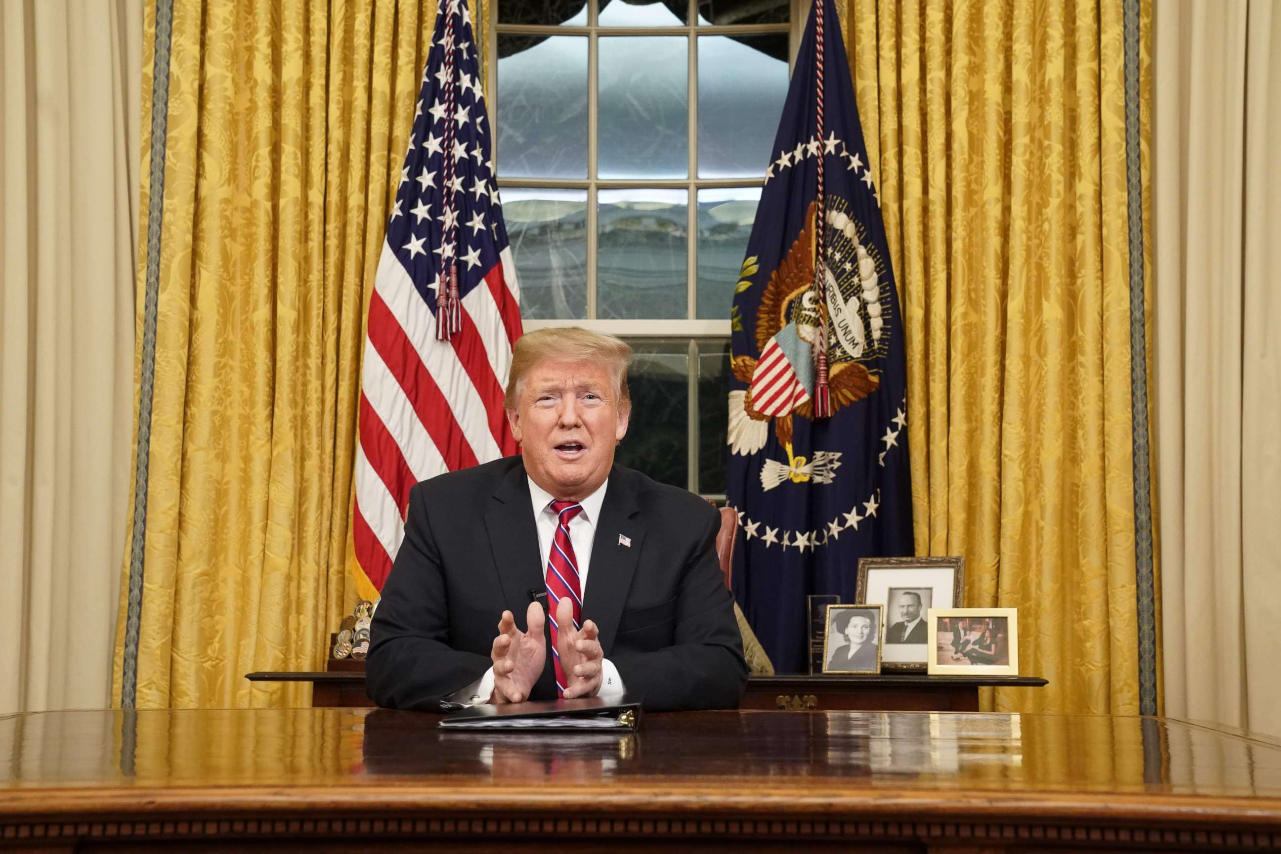 PHOTO: President Donald Trump delivers a televised address to the nation on funding for a border wall from the Oval Office of the White House in Washington, Jan. 8, 2019.