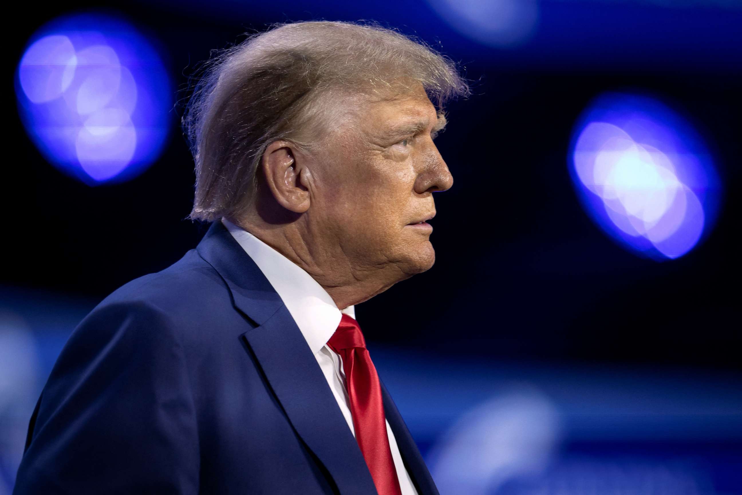 PHOTO: Former President and Republican presidential candidate Donald Trump takes the stage during the Turning Point Action Conference in West Palm Beach, Florida, July 15, 2023.