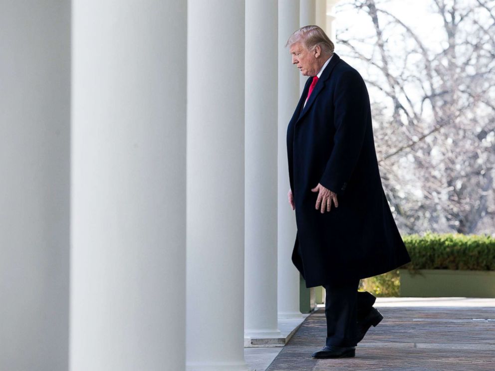 PHOTO: President Donald Trump walks down the Colonnade to deliver remarks on ending the partial shutdown of the federal government, in the Rose Garden of the White House in Washington, Jan. 25, 2019.
