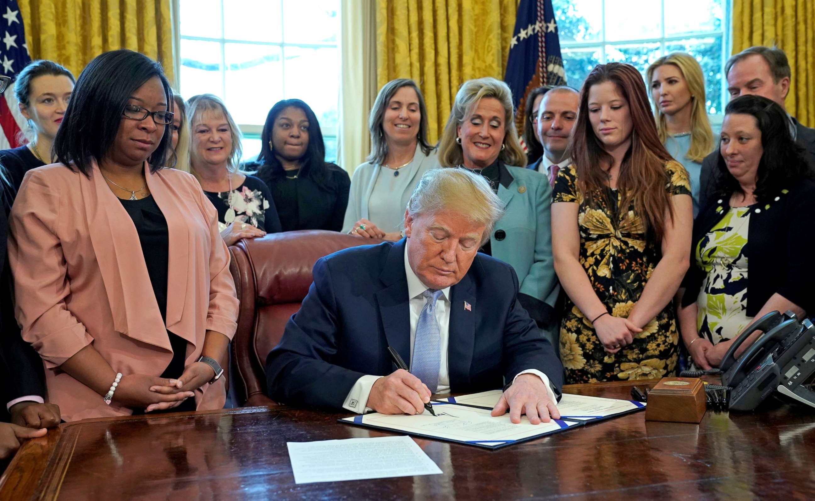 PHOTO: President Donald Trump signs H.R. 1865 "The Allow States and Victims To Fight Online Sex Trafficking Act" at the White House in Washington, April 11, 2018.