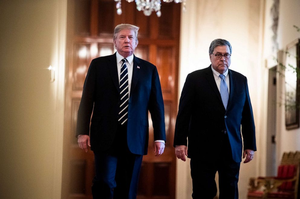 PHOTO: President Donald Trump and Attorney General William Barr arrive to participate ceremony in the East Room at the White House on May 22, 2019, in Washington.