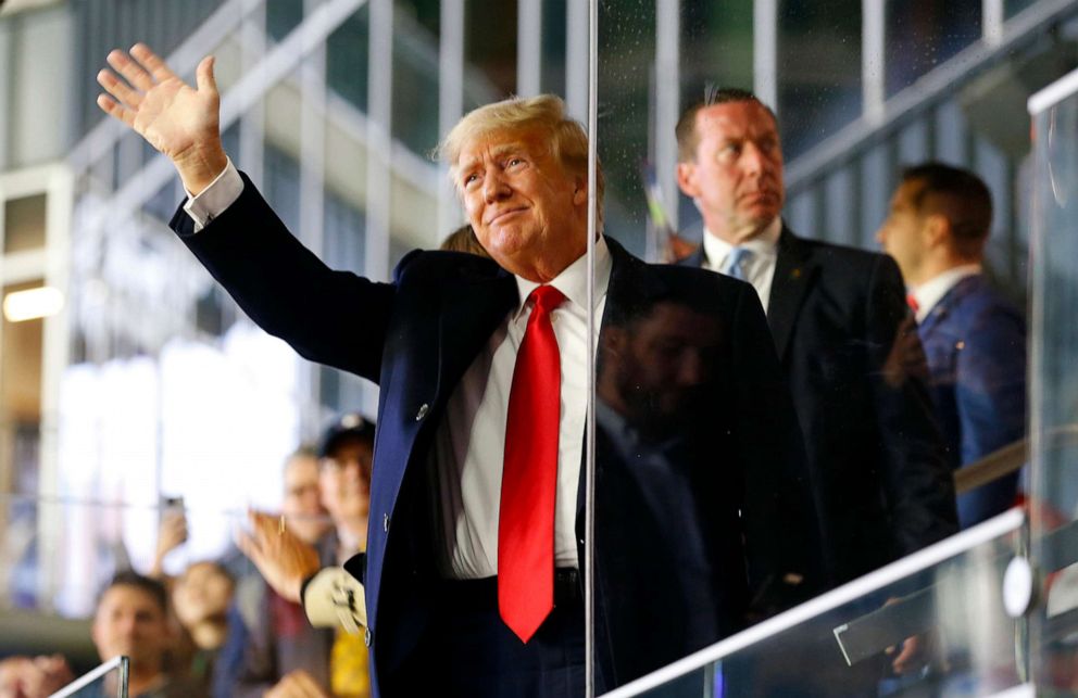PHOTO: Former president of the United States Donald Trump waves prior to Game Four of the World Series between the Houston Astros and the Atlanta Braves Truist Park on Oct. 30, 2021, in Atlanta.