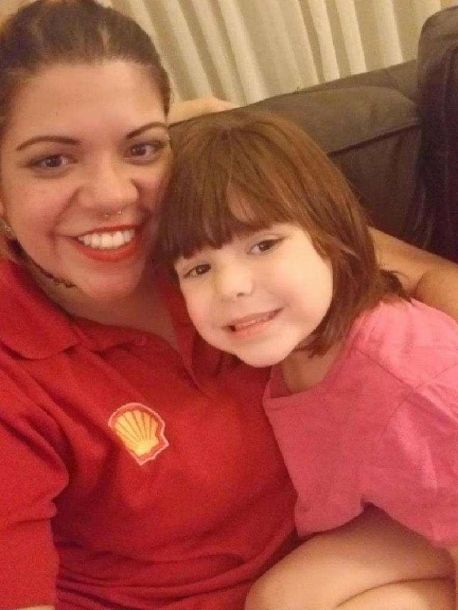 PHOTO: Donna Pena poses in this undated photo with her 4-year-old daughter. Harris County Sheriff Office officials say Pena was gunned down by robbers, March 8, 2019, at a gas station where she worked in Houston.
