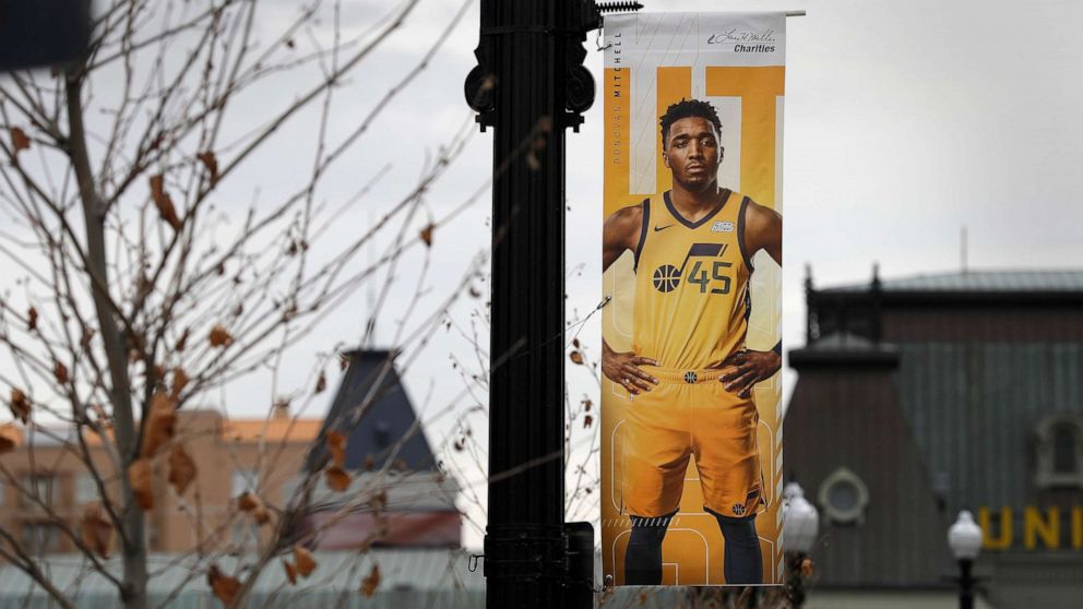 PHOTO: A poster of Utah Jazz guard Donovan Mitchell hangs near an empty main entrance at Vivint Smart Home Arena, in Salt Lake City, Utah, on March 13, 2020.