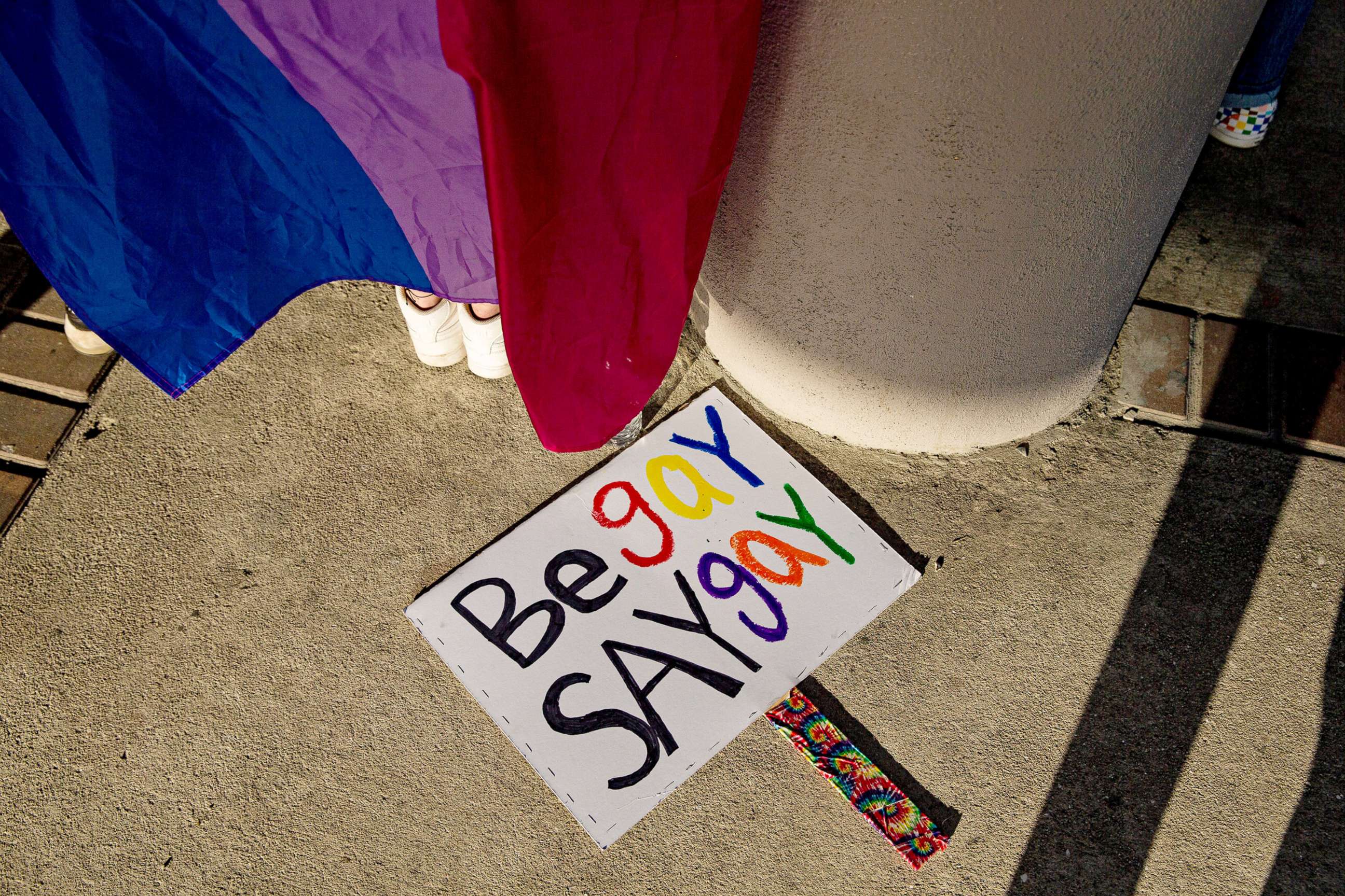 PHOTO: A sign was used in a "Don't Say Gay" protest in downtown Fort Myers, March 6, 2022. Several dozen people marched and chanted. The march was held to protest  Florida's "Don't Say Gay" legislation. 