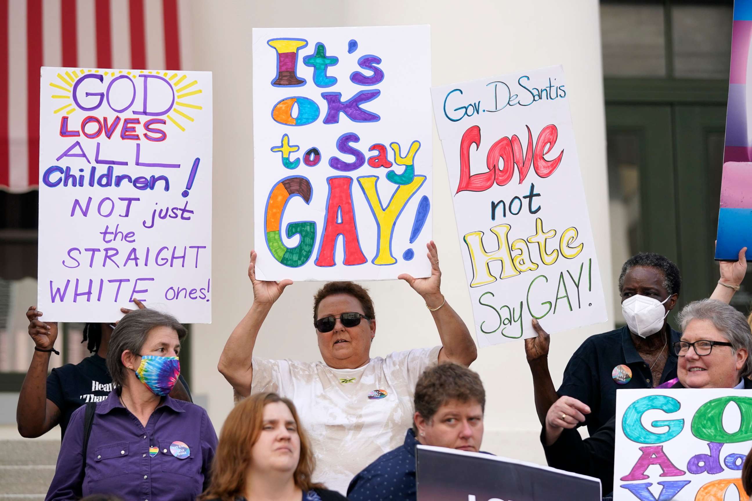 PHOTO: Demonstrators gather to speak on the steps of the Florida Historic Capitol Museum in front of the Florida State Capitol, March 7, 2022, in Tallahassee, Fla. 