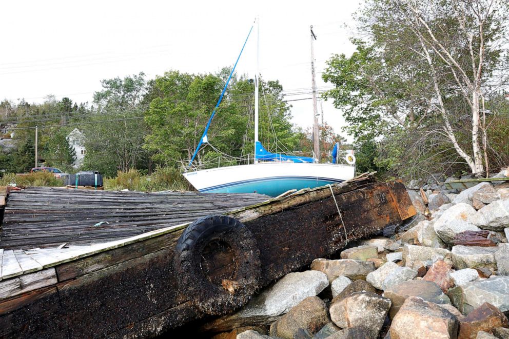 PHOTO: A sailboat and a dock are pushed up on the rocks after the departure of Hurricane Dorian in Halifax, Nova Scotia, Canada, Sept. 8, 2019. 