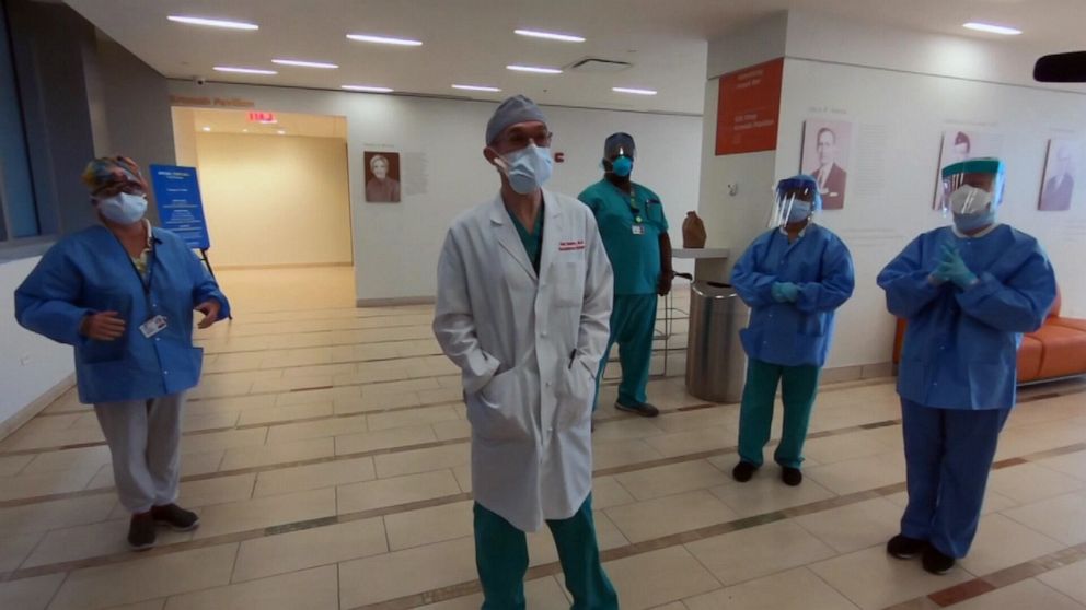 PHOTO:  Dr. Paul Saunders, a heart surgeon, returned to work to treat COVID-19 patients at Maimonides Medical Center.