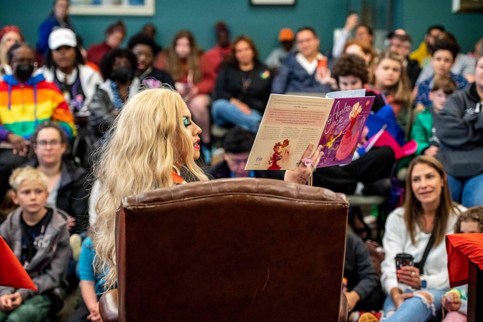 PHOTO: Jason Carter in drag as Monica Moore, 22, hosts a drag story hour for families and children during the Pride Festival in Provincetown, Mass., on June 3, 2023.