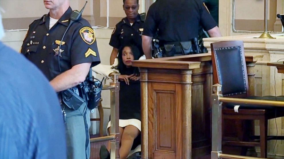 PHOTO: Former juvenile court judge Tracie Hunter is dragged from court, July 22, 2019, after sentencing in Cincinnati.