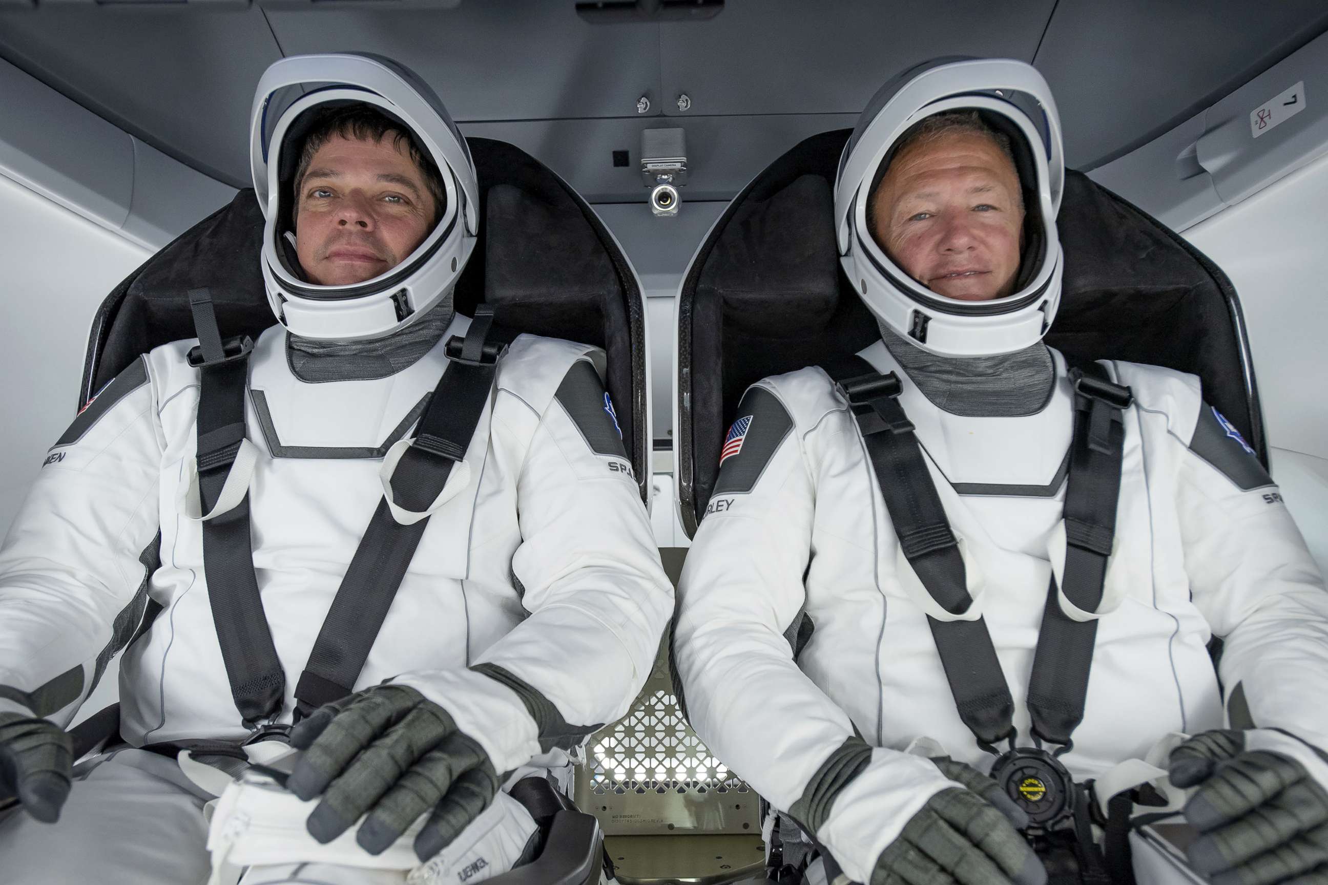PHOTO: NASA astronauts Bob Behnken, left, and Doug Hurley participate in a fully integrated test of SpaceX Crew Dragon flight hardware at the SpaceX processing facility on Cape Canaveral Air Force Station in Florida, March 30, 2020.