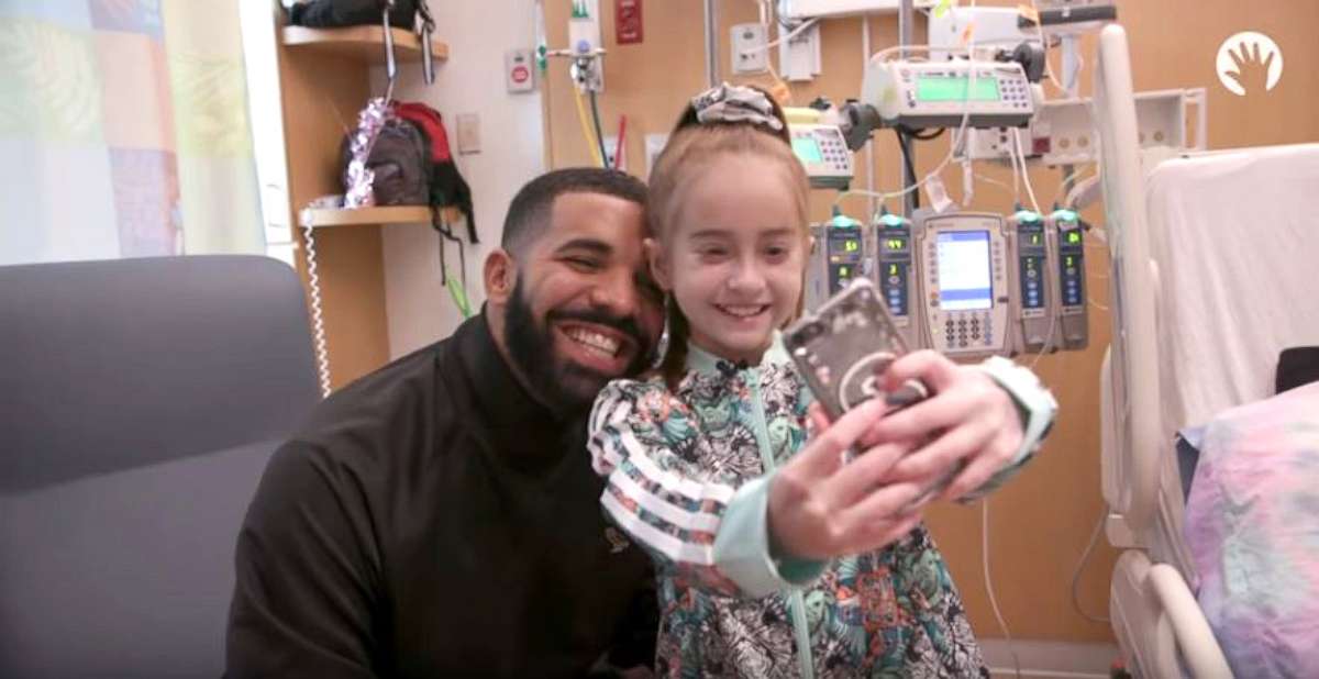 PHOTO: Drake visits 11-year-old heart transplant patient for her birthday.