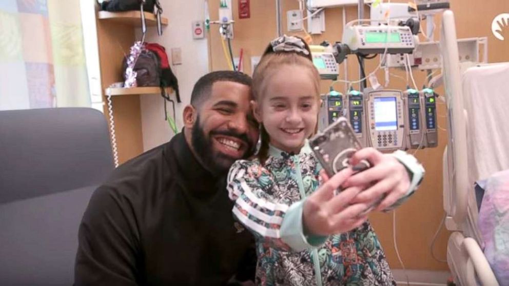 PHOTO: Drake visits 11-year-old heart transplant patient for her birthday.
