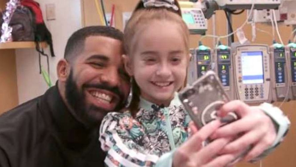 PHOTO: Drake visits 11-year-old heart transplant patient for her birthday.