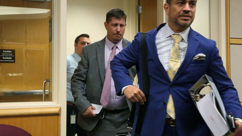 PHOTO: Michael Drejka, center, enters the courtroom, Aug. 22, 2019, in Pinellas County, Fla.